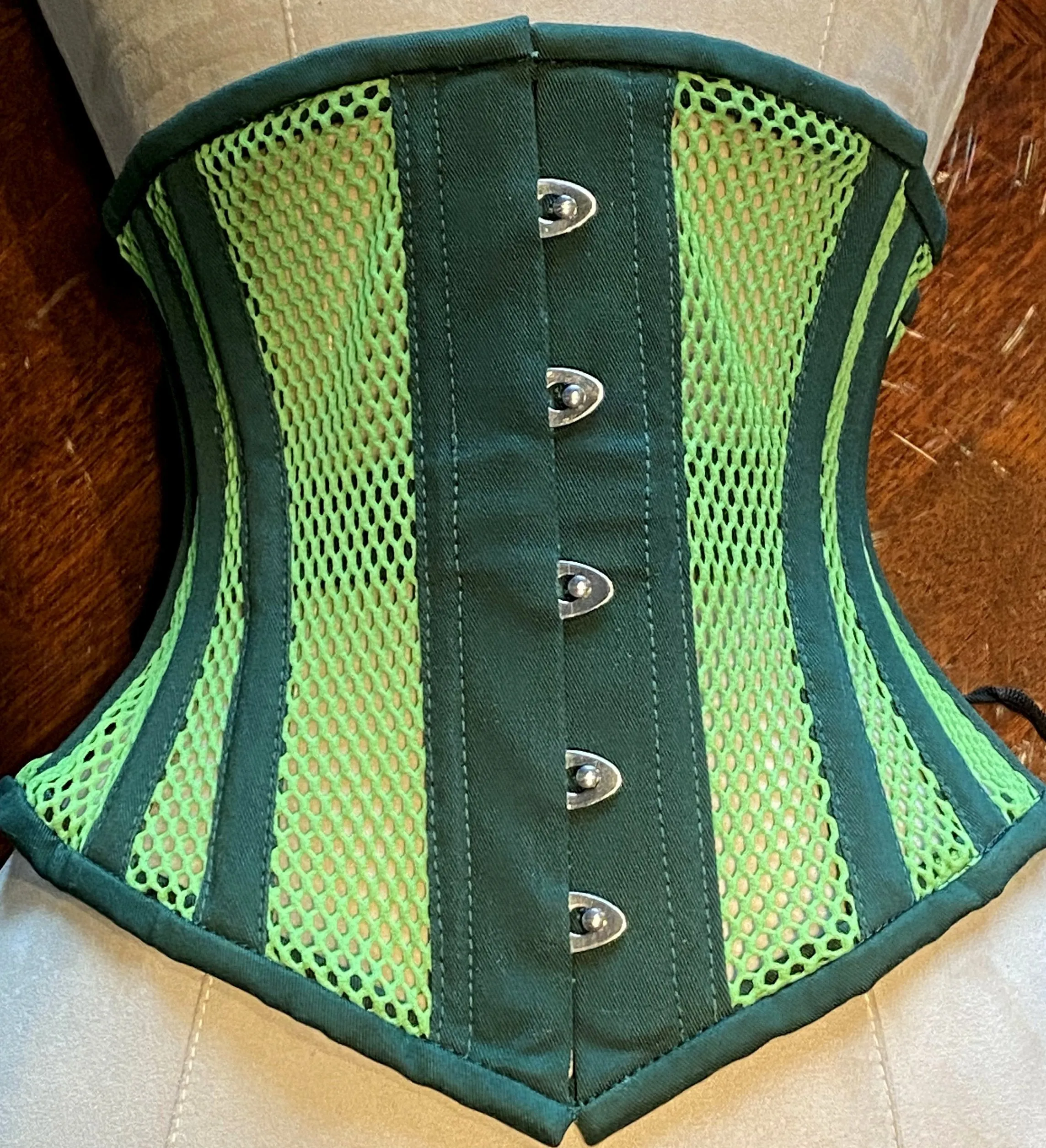 Real steel boned underbust underwear green corset from transparent mesh and cotton. Real waist training corset for tight lacing.